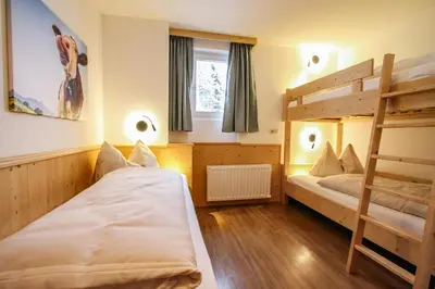 Ein Bett oder Betten in einem Zimmer der Unterkunft Ferienwohnung Königsleiten 121b - Top 1