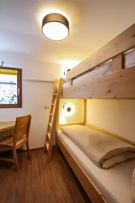 Ein Bett oder Betten in einem Zimmer der Unterkunft Ferienwohnung Königsleiten 121b - Top 3