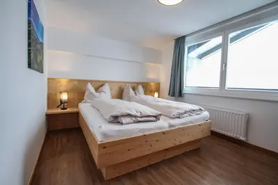 Ein Bett oder Betten in einem Zimmer der Unterkunft Ferienwohnung Königsleiten 121b - Top 3