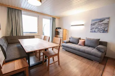 Ein Sitzbereich in der Unterkunft Ferienwohnung Königsleiten 121b - Top 3