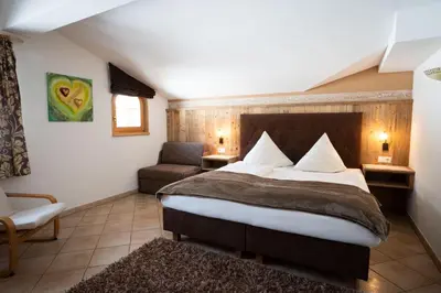 Ein Bett oder Betten in einem Zimmer der Unterkunft Pension Edelweiss