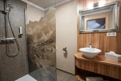 Ein Badezimmer in der Unterkunft Pension Edelweiss