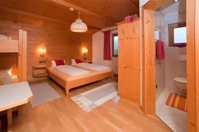 Ein Bett oder Betten in einem Zimmer der Unterkunft Apartment in St. Johann in Tirol 555