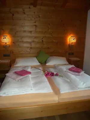 Ein Bett oder Betten in einem Zimmer der Unterkunft Apartment in St. Johann in Tirol 555