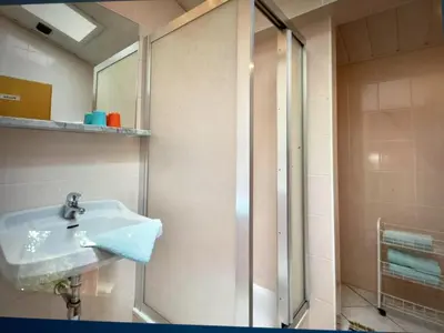 Ein Badezimmer in der Unterkunft Appartement Foidl mit Kaiser & Hornblick