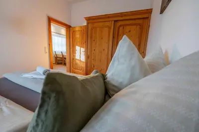 Ein Bett oder Betten in einem Zimmer der Unterkunft Riedhof-Zuahaus