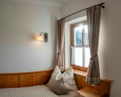 Ein Bett oder Betten in einem Zimmer der Unterkunft Riedhof-Zuahaus