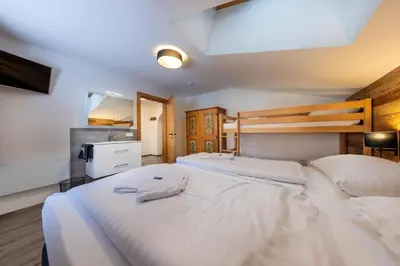Ein Bett oder Betten in einem Zimmer der Unterkunft Haus Eckhausl Top 2 Hirsch