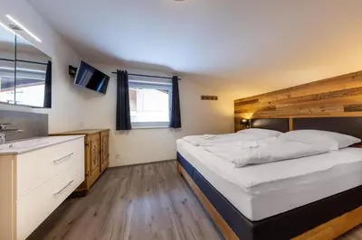 Ein Bett oder Betten in einem Zimmer der Unterkunft Haus Eckhausl Top 2 Hirsch