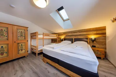 Ein Bett oder Betten in einem Zimmer der Unterkunft Haus Eckhausl Family