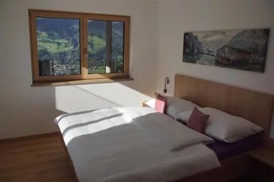 Ein Bett oder Betten in einem Zimmer der Unterkunft Apart Elina