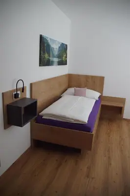 Ein Bett oder Betten in einem Zimmer der Unterkunft Apart Elina