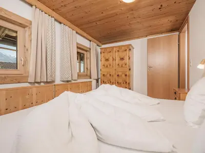 Ein Bett oder Betten in einem Zimmer der Unterkunft Ferienhaus Hanserhof