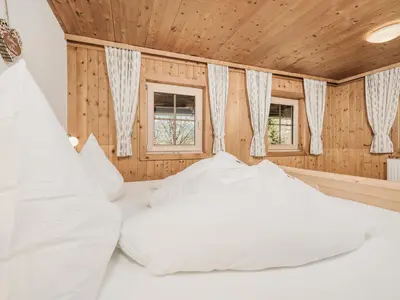 Ein Bett oder Betten in einem Zimmer der Unterkunft Ferienhaus Hanserhof