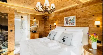 Ein Bett oder Betten in einem Zimmer der Unterkunft Das Kitz - Chalet Steuerberg Kitzbühel