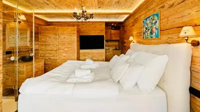 Ein Bett oder Betten in einem Zimmer der Unterkunft Das Kitz - Chalet Steuerberg Kitzbühel