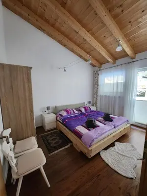 Ein Bett oder Betten in einem Zimmer der Unterkunft Chalet Fini