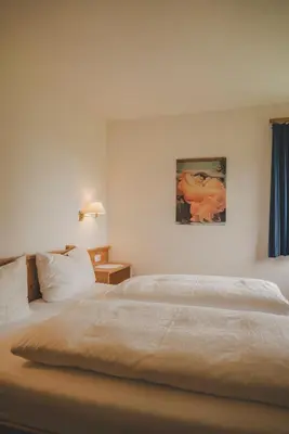 Ein Bett oder Betten in einem Zimmer der Unterkunft Demeterhof Knolln