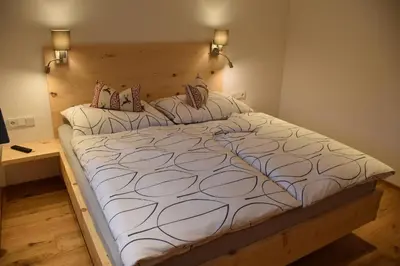 Ein Bett oder Betten in einem Zimmer der Unterkunft Landhaus Anneliese