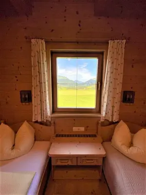 Ein Bett oder Betten in einem Zimmer der Unterkunft Ferienwohnung Bergblick