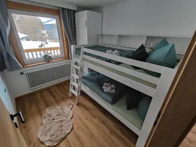 Ein Bett oder Betten in einem Zimmer der Unterkunft Apartment Anni im Haus Hintertal