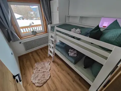 Ein Bett oder Betten in einem Zimmer der Unterkunft Apartment Anni im Haus Hintertal