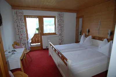 Ein Bett oder Betten in einem Zimmer der Unterkunft Altenhauser Hof