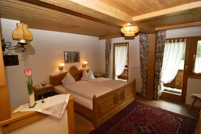 Ein Bett oder Betten in einem Zimmer der Unterkunft Altenhauser Hof
