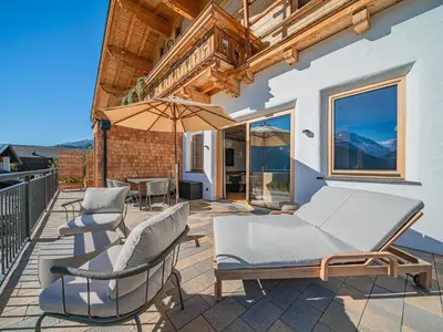 Ein Balkon oder eine Terrasse in der Unterkunft Premium Apartment Sunnseit