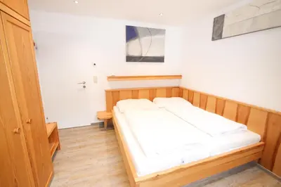 Ein Bett oder Betten in einem Zimmer der Unterkunft Ferienwohnung Königsleiten 89 - Top 4