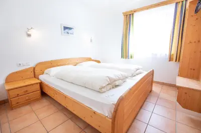 Ein Bett oder Betten in einem Zimmer der Unterkunft Chalet Hochkrimml 142