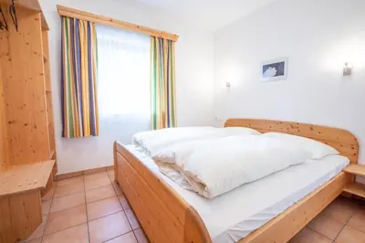 Ein Bett oder Betten in einem Zimmer der Unterkunft Chalet Hochkrimml 142