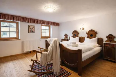 Ein Bett oder Betten in einem Zimmer der Unterkunft Tiroler TRAUMHAUS Hochzillertalblick - by AlpenLuxus Collection
