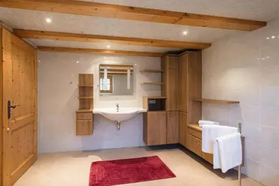 Ein Badezimmer in der Unterkunft Tiroler TRAUMHAUS Hochzillertalblick - by AlpenLuxus Collection
