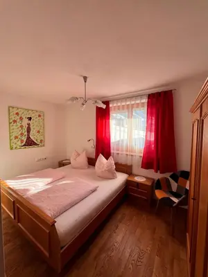 Ein Bett oder Betten in einem Zimmer der Unterkunft Apartment Sunshine Bruck am Ziller