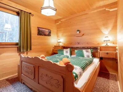 Ein Bett oder Betten in einem Zimmer der Unterkunft Hütte zum Dillental