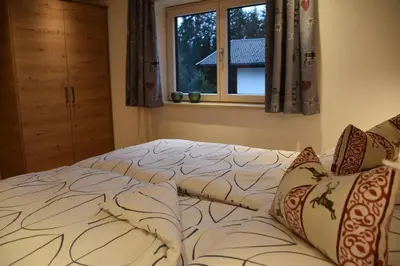 Ein Bett oder Betten in einem Zimmer der Unterkunft Landhaus Anneliese