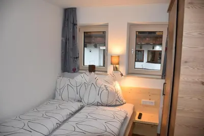 Ein Bett oder Betten in einem Zimmer der Unterkunft Landhaus Anneliese