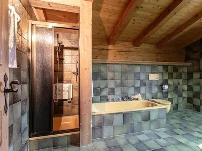 Ein Badezimmer in der Unterkunft Chalet Rettensteinblick