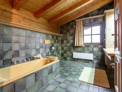 Ein Badezimmer in der Unterkunft Chalet Rettensteinblick