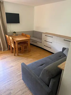 Ein Sitzbereich in der Unterkunft Apartmenthaus Ferdinand