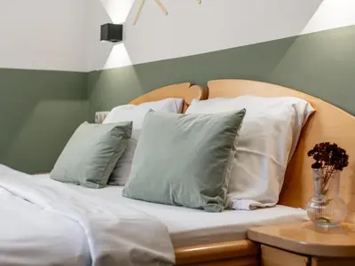 Ein Bett oder Betten in einem Zimmer der Unterkunft Pension Schreder