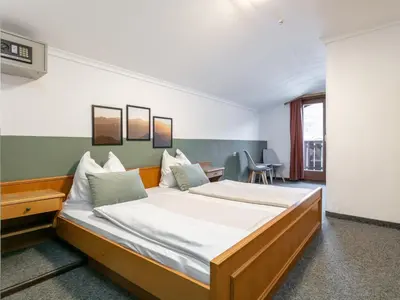 Ein Bett oder Betten in einem Zimmer der Unterkunft Pension Schreder