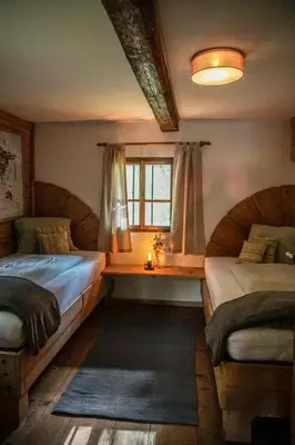 Ein Bett oder Betten in einem Zimmer der Unterkunft Ferienhaus Venusberg