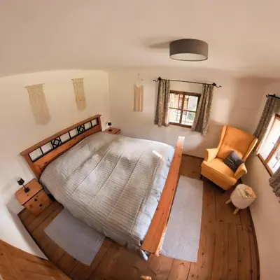 Ein Bett oder Betten in einem Zimmer der Unterkunft Ferienhaus Venusberg