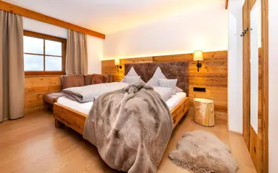 Ein Bett oder Betten in einem Zimmer der Unterkunft Landhaus Simone incl JOKER CARD by All in One Apartments