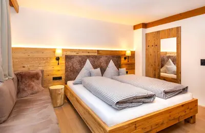 Ein Bett oder Betten in einem Zimmer der Unterkunft Landhaus Simone incl JOKER CARD by All in One Apartments