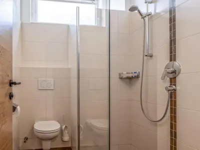 Ein Badezimmer in der Unterkunft Perle
