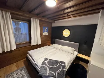 Ein Bett oder Betten in einem Zimmer der Unterkunft Kitzbühel City Appartement