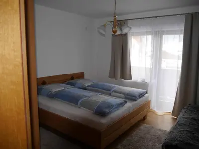 Ein Bett oder Betten in einem Zimmer der Unterkunft Ferienwohnung Enn